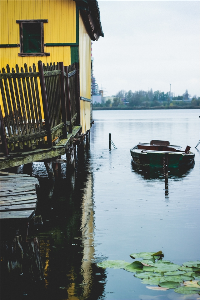 originally the lake is to cool down the factory, but local people made benefit of this and built houses on the lake for summer holidays