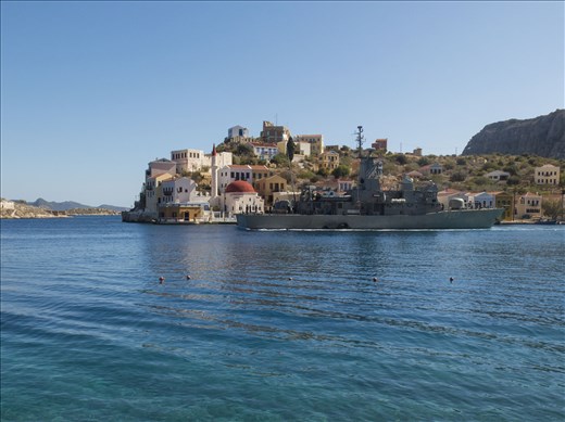 A warship leaving the harbour