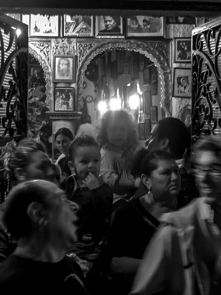 A popular bar in Plaza Larga, has its walls adorned with photos past dancers & singers 