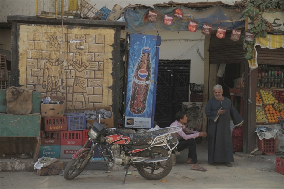 The secrets of ancient hieroglyphics have become decorative stickers and a background for Egyptian youngsters fascinated by western culture.  