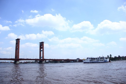 Ampera Bridge in daylight. Ampera Bridge is a symbol and pride of Palembang City