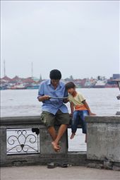 Reading newspaper at “Plaza Benteng Kuto Besak” It’s located on riverside Musi: by palembangcity, Views[449]