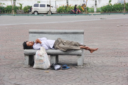 Praying Slept Man at “Plaza Benteng Kuto Besak