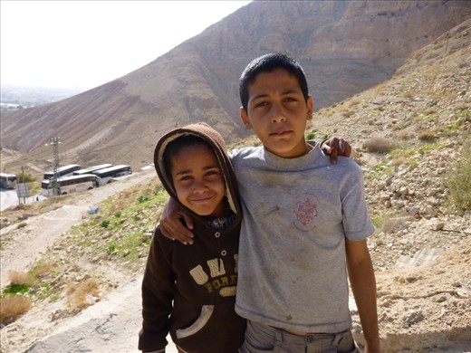 Children in Jericho making a living from the tourist trade. A shekel for a cute face, two for a toothy smile.