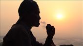 Setumbu Hill sunrise, old man smoking traditional corn leaf javanese cigarette: by pannonica, Views[366]