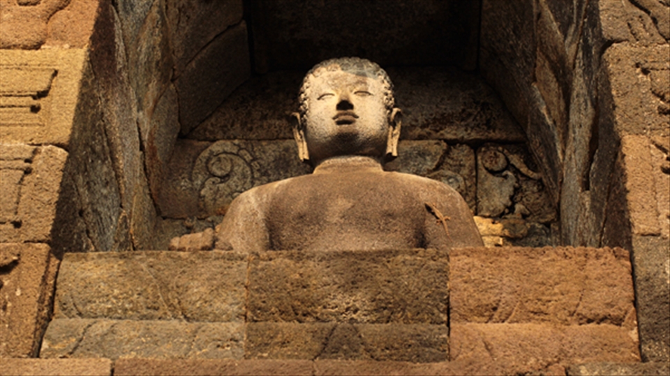 Buddha with lizard (cicak) in Borobudur Temple, Yogyakarta