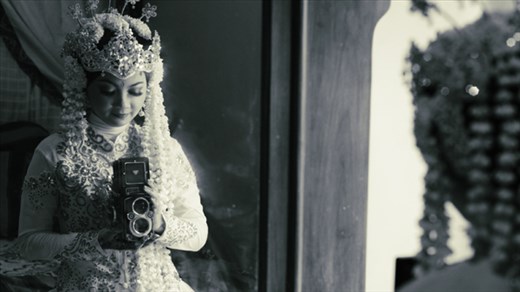 Cantik Tia, the day of her wedding.  Traditional javanese dress.