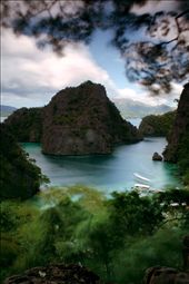 Coron, Palawan, Philippines: A new day of exploring the municipality is started 
as bangka boats come and go amidst the limestone cliffs to pick up and drop off 
their passengers as seen from the highest portion of the trek heading to 
Kayangan Lake.
: by paolonacpil, Views[248]