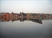 The ghats on the river yamuna in Mathura can be seen from the other side of the river. An old boat long left in the shalow waters can b seen from the unpopular side of the river.: by partham902005, Views[480]