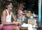 A man and woman prepare breakfast for fellow stall workers. : by passionatenomad, Views[206]