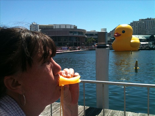 Rubber duck at Darling Harbour, Florentijn Hofman. A woman partakes.