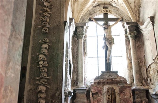 The room beneath the church was used as a chapel and due to a large number of human bones to be preserved, they decided to decorate the room with those skeletons and bones. 