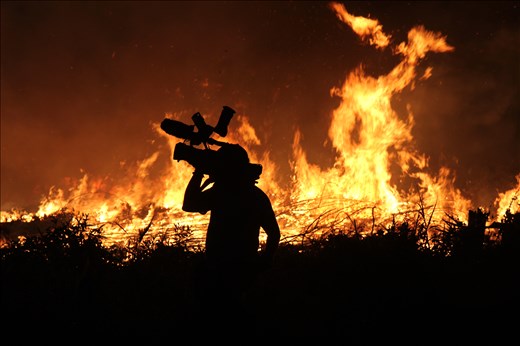 Local cameraman bares witness to the destructiiveannual Indonesian forest fires.
