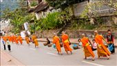 Everyday, a procession of Laotian Buddhist monks visits the surrounding township to collect food from the locals.: by paulfilm, Views[277]