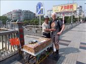 Streetseller with huge Chestnut cake: by paulinemendes, Views[596]