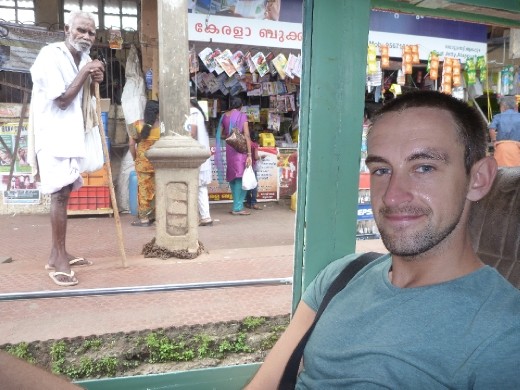 On the boat leaving Allepay, a wellwisher waving us off in the background