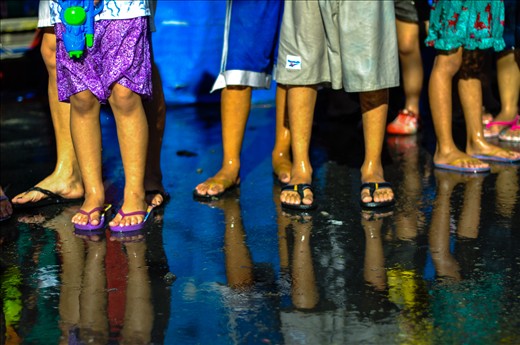 people who wishes to see the parade must also get themselves wet. it's a part of identification with the whole celebration