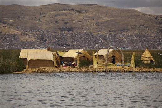 Uros Floating Islands, with the city of Puno on the background.