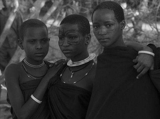Expectations - The Datoga who also live in and around the Great East African Rift Valley and not far from the Masai are also nilotic pastoralists. There is a centuries old mutual dislike between these two tribes in Northern Tanzania. These young Datoga girls possibly ponder their future in Masailand ?