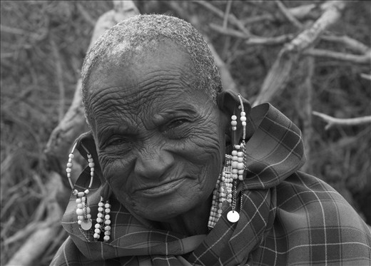 Wisdom - In the same village as the baby girl with the goat I came across this interesting elderly Masai woman. WIth age comes the wisdom and knowledge of days gone by, of love, war and warriors. She knows not what the future holds but only that the past has moulded her and the present is ever fleeting !