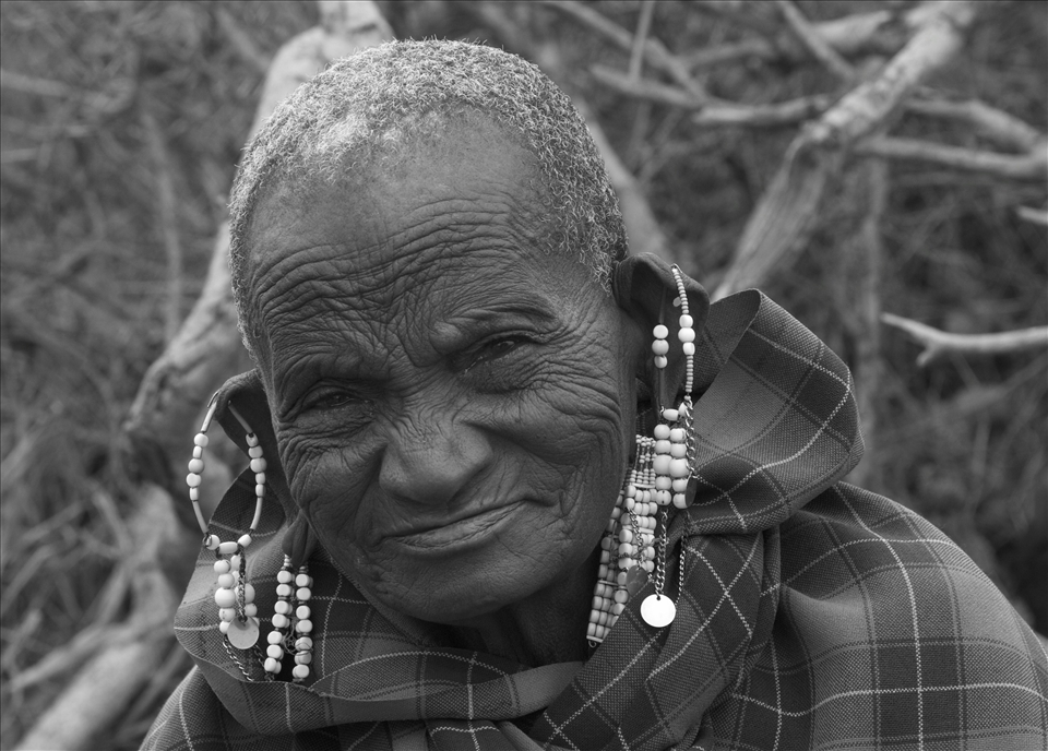 Wisdom - In the same village as the baby girl with the goat I came across this interesting elderly Masai woman. WIth age comes the wisdom and knowledge of days gone by, of love, war and warriors. She knows not what the future holds but only that the past has moulded her and the present is ever fleeting !