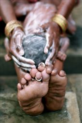 This kind of bath is an Andhra Pradesh traditional habit made twice a day.: by pepepont, Views[327]
