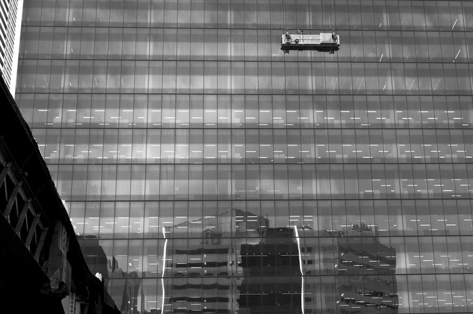 Sometimes I dream of  somehow separating myself from the commute, the city, the office, work-life as I know it and putting myself on a different plane. This view from my arrival platform of window washers juxtaposed on a reflection of the sky, with the offices and station below help to visualize this thought. 