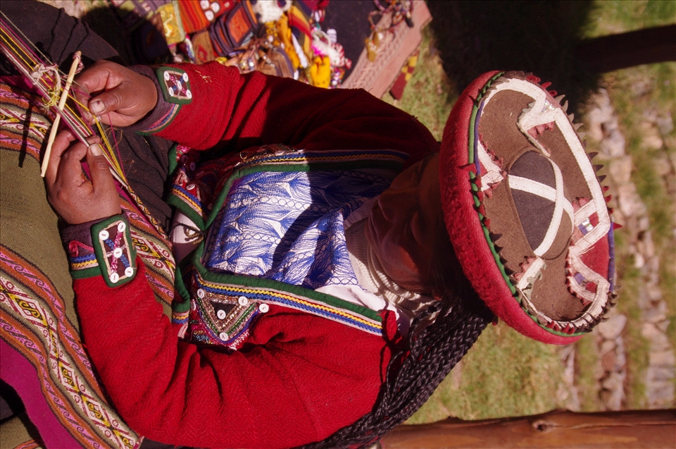 Peruvian woman patiently working, it takes days