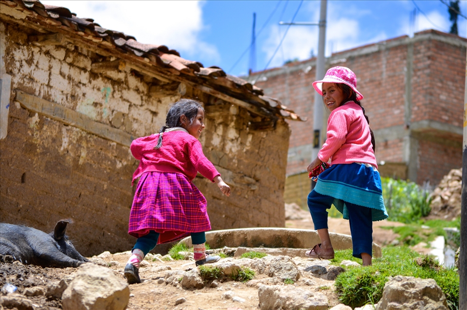These little girls passed us on their way up the mountain. They were shy and giggling - looking away every time one of us smiled at them. They ran past our group and up the stairs, turning around to stare and laugh at the strange foreign visiters. Their curiosity put a childish grin on all of our faces.