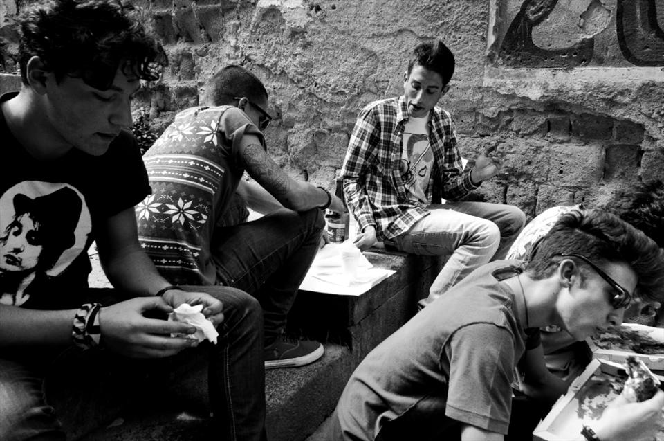 One of the iconic pizzeria in Naples is a not be missed Da Michele. As there is a long queue to get a table, most of the people decided to eat the pizza somewhere around the Pizzeria. This was the case with us as well. When I was about to finish my pizza these Italian guys turned up and could not resist to take some picture about them.