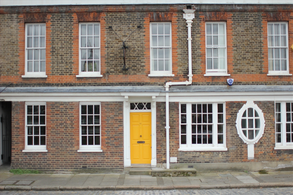 when every building looks the same, someone paints their door yellow.