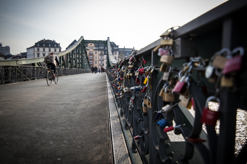 While crossing the bridge finding locked love all along.