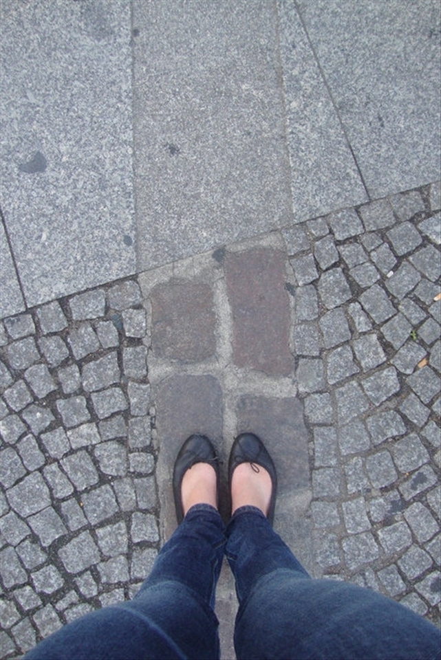 I called this photo “A right to choose” as the line in the middle shows where the Berlin Wall used to be built and the whole Berlin is still somehow affected by this period of time. These two parts led by different ideologically oriented governments, divided the very same people into two groups, but nowadays, after 25 years of its fall, Berliners can decide to make a step right or left without any consequences.