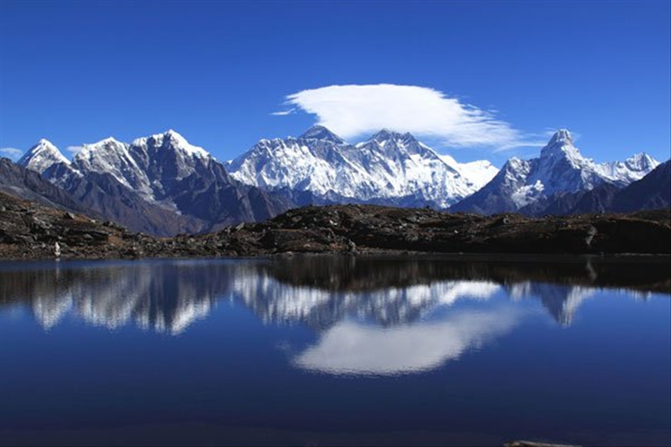 Longest Mountainous Range The Annapurna range reflection in Fewa Lake