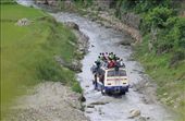 This is photo of a bus overloaded and its rainy season the way turned into rive rbut nothing stops.: by photo-nature, Views[298]