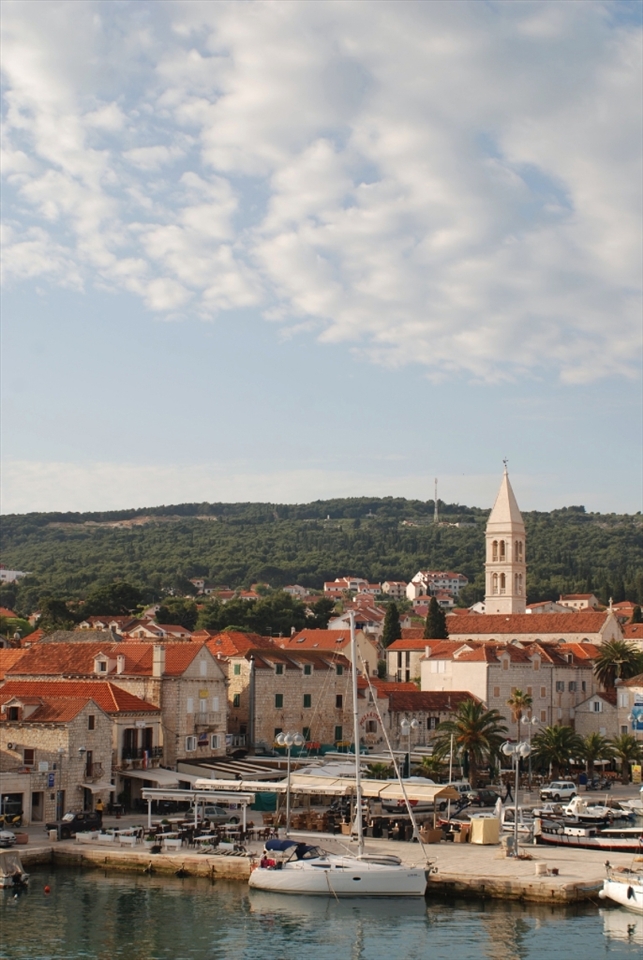 Last view of the island when leaving by boat - the picturesque Supetar Marina.