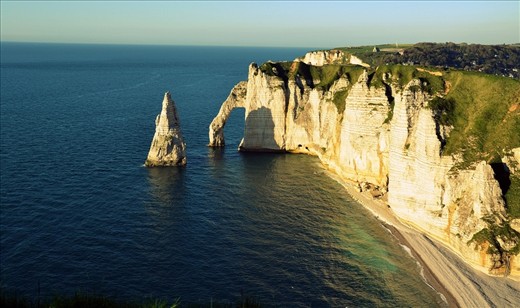The Elephant was looking thoughtfully at the opposite shore.