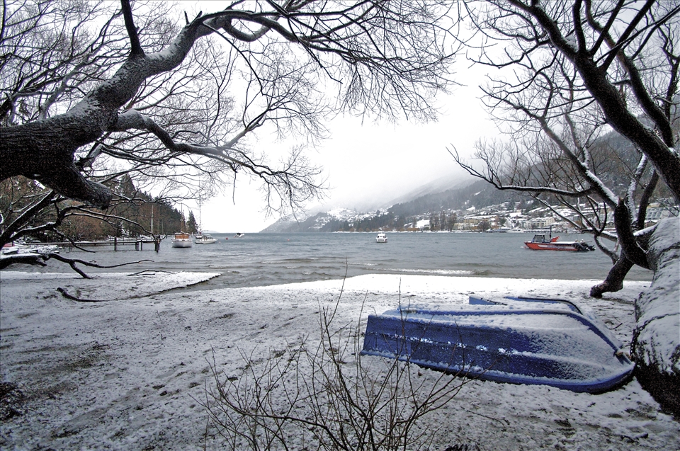 Boat upturned, The snow has set in, no fishing in Lake Wakatipu.