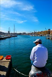 On the Go still following my group in my Europe tour & walling pass this arbour. Everyone was just running around but this man was just sitting there calm, fishing as I was walking the stress walk to see as much as I can see. I took a quick snap & realized that I had captured the full Serenity of the moment. But really behind this man was a pure KAOS.: by picturevibes, Views[367]
