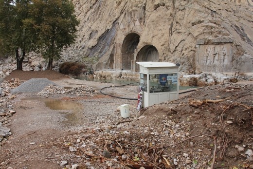 Kermanshah - Taq-i-Bustan carvings - flooded entrance with fallen rocks