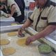 Iran - Qom - sprinkling the chopped pistachios on the dough Views[447]
