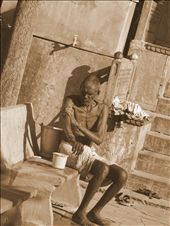 a poor old man was taking bath in open backyard of fort: by piyushrb, Views[776]