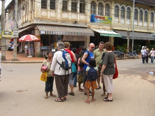 Kids peddling wares in Phnom Phen