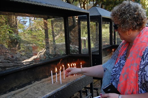 Lighting a candle Mother Mary's house