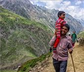 A Pilgrim and his child during the track of Amarnath .: by plaban, Views[367]