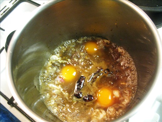Poach the egg in the spicy tamarind sauce