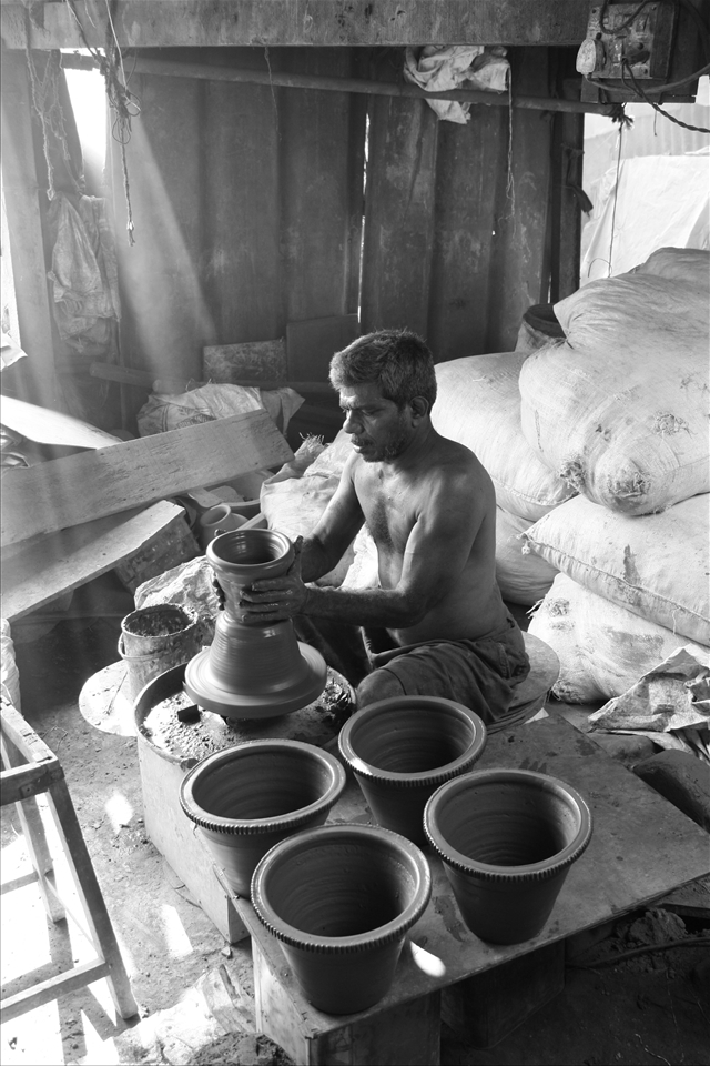 Place doesn’t matter for art to take shape in the hands of an artisan. For this potter the satisfaction of making something artistic is of paramount happiness.