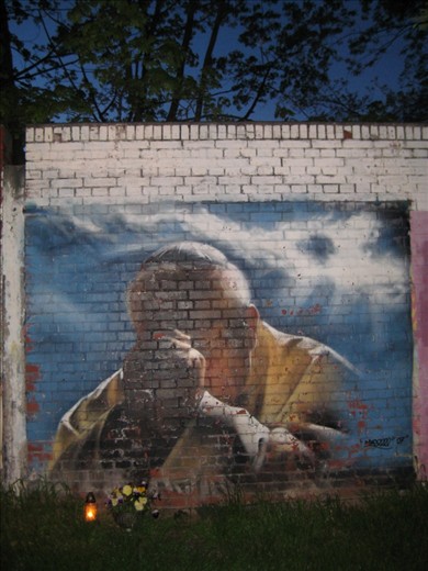 Religious Street art. Graffiti with candles.