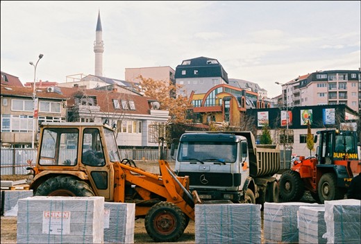 And if you look down – you find yourself in the middle of a compressed city full of construction sites standing next to new and shiny buildings lost in myriads of cars parked on top of each other. This city leaves a feeling of a place in the middle of its growth, yet far from blooming. 