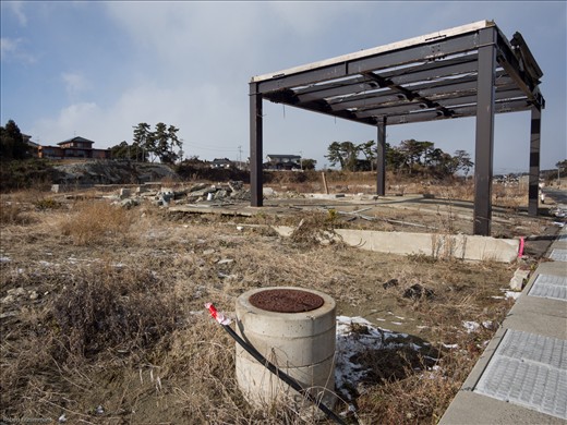The drain shows how much was taken away by the tsunami as it is at ground level